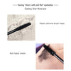 Close-ups of a black mascara brush head and a swatch on skin