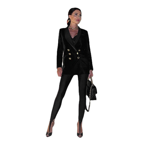 Black stirrup leggings styled with a double-breasted blazer and pointed heels