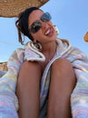 Close view of the striped hood and neckline