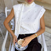 White polka-dot scarf-neck blouse, front view