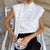 White polka-dot scarf-neck blouse, front view
