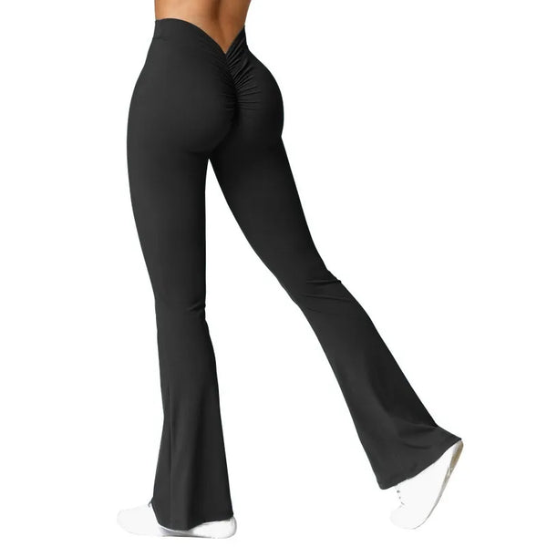 Black flared leggings in a side pose