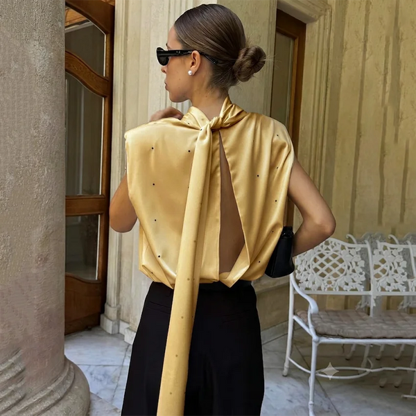 Champagne blouse showing open back and long neck ties