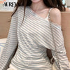 Blue striped asymmetric top with lace neckline