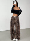 Leopard-print wide-leg pants styled with a black top
