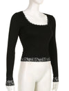 Black square-neck top on a mannequin, front view