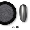 Dark gray chrome-effect nail pigment labeled MC-18 with a sample tip