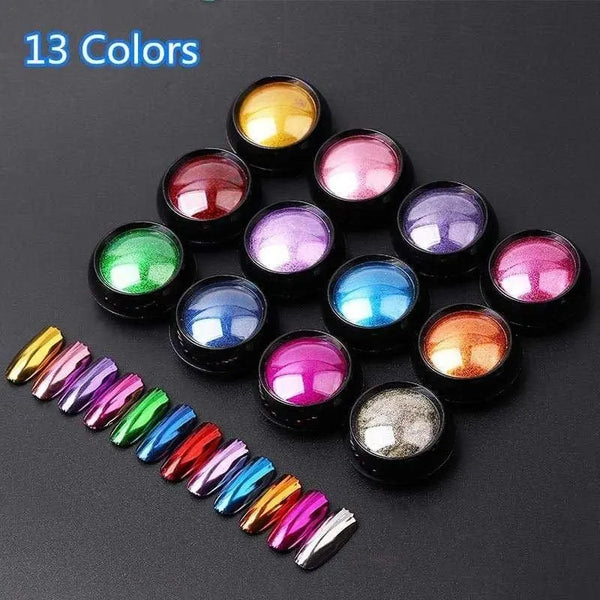 Open pigment powder jars beside metallic nail-color samples