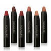 Five uncapped lip crayons in red, brown and nude tones
