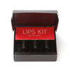 Open black box containing three lip crayons