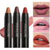 Three lip crayons beside pink, mauve and rust lip-color examples