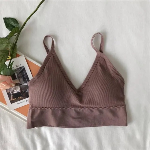 Mauve ribbed V-neck bralette arranged in a flat lay