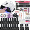Nail art kit with a black-trim white lamp, pink nail drill, gel bottles, files, and tools