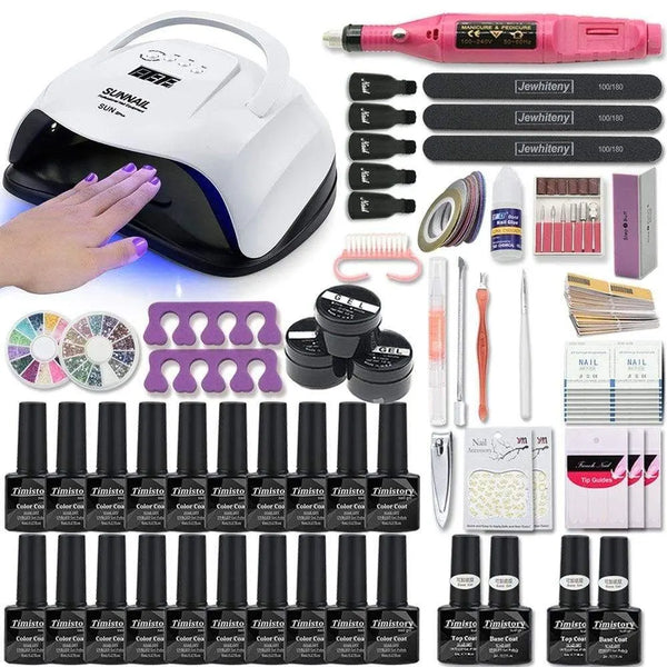 Nail art kit with a black-trim white lamp, pink nail drill, gel bottles, files, and tools