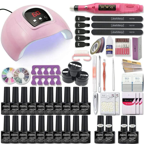 Nail art kit layout with a pink dome lamp, pink nail drill, gel bottles, files, and tools