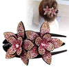 Pink rhinestone flower hair claw with an updo styling example