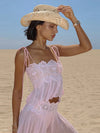Close view of the pink lace bodice and tie straps