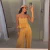 Yellow lace-trim crop top and pleated pants