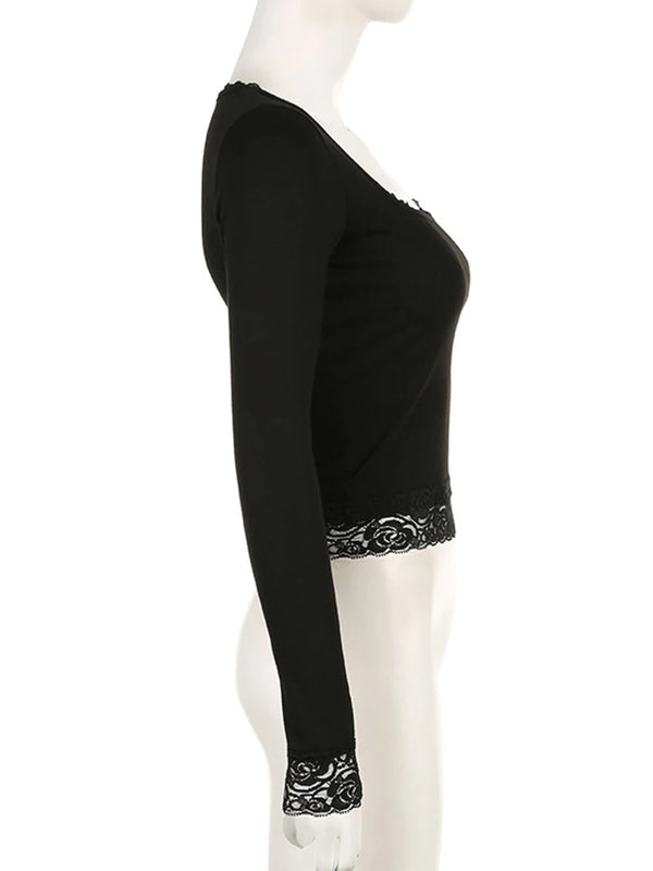 Side view of the fitted black lace-trim top