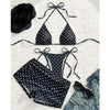 Polka-dot triangle bikini top, tie-side bottoms, and matching shorts